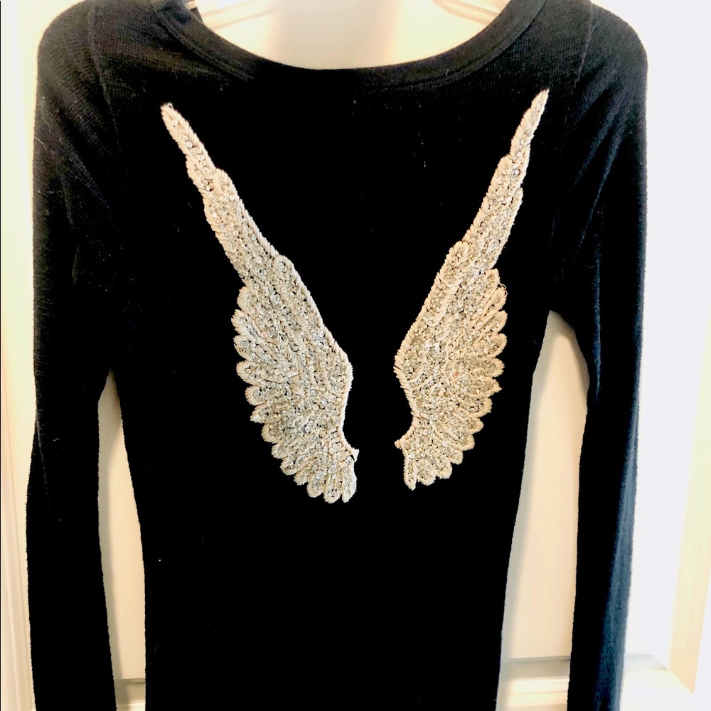 Twisted Heart Long Sleeve Top with crystal cream colored wings on back.